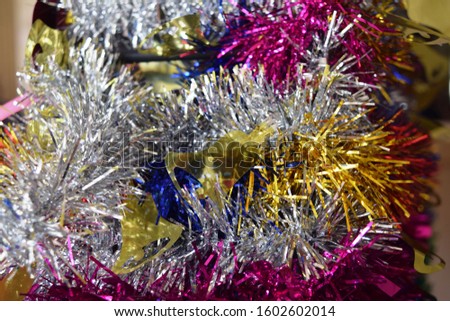 Close up selective focus Christmas tree ornaments decoration, grainy texture backhround