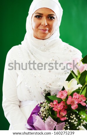 Beautiful young oriental bride preparing for wedding