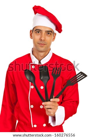 Chef showing black kitchen utensils isolated on white background