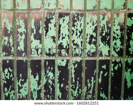 Black-green tile background. large view. Texture for background