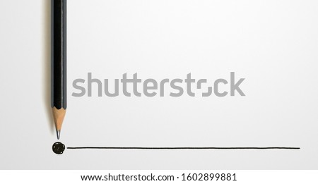 Black colour pencil with outline to end point on white background. Creativity inspiration ideas concept Royalty-Free Stock Photo #1602899881