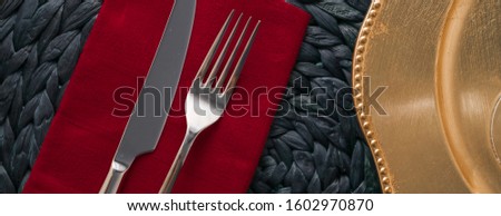 Table scape, menu and interior concept - Holiday table setting with red napkin and silver cutlery, food styling props, vintage set for wedding, event, date, party or luxury home decor brand design