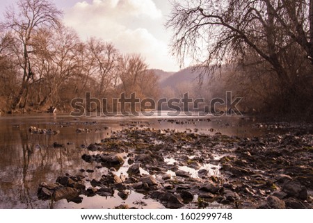 Beautifull river. Pictured during winter time. 