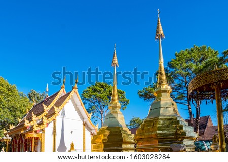 Wat Phra That Doi Tung, Chiang Rai, Thailand. The two famous golden pagodas temple.