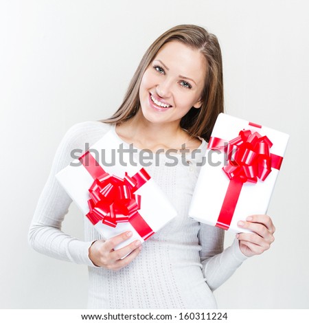 happy woman holding gift box