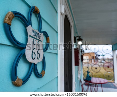 route 66 sign on blue house