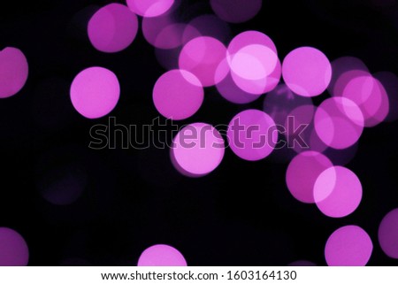 Purple bokeh on black background