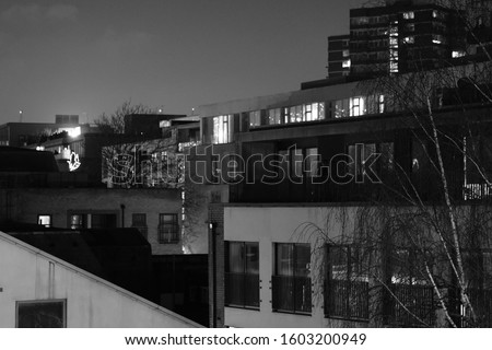 Black and white image of urban life in London