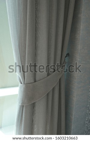 Luxury gray curtain folded or wrapped. 