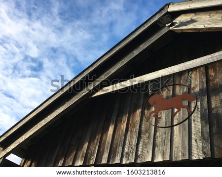 Barn with old horse sign