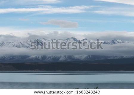 Snow mountain view along lake and cloud New Zealand
