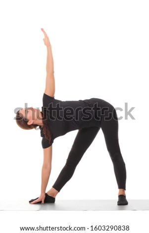 Sporty young woman doing yoga practice isolated on white background.