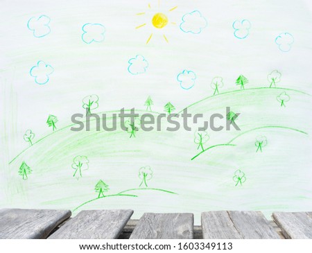 Empty wooden table on the background of summer nature