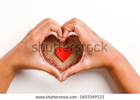 Making heart shape with hand on white background. valentine day concept 