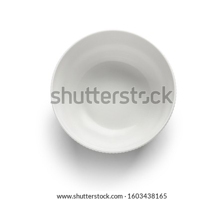 Empty ceramic plate on white background Royalty-Free Stock Photo #1603438165