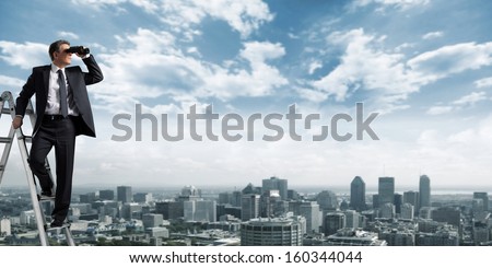 Business man with binoculars spying on competitors Royalty-Free Stock Photo #160344044