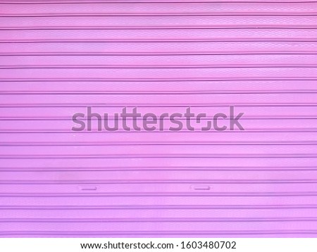 Pink rolling shutters have two handles.