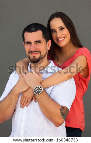 Young couple in a loving pose.