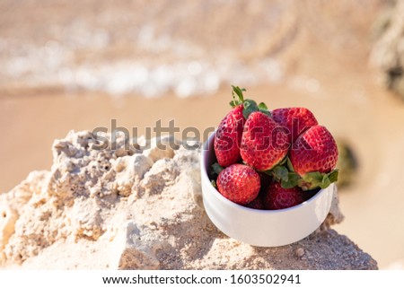 strawberries on the background of the sea