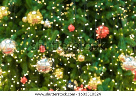 Blur Christmas toy, ball decoration on christmas tree with blur background. christmas festival. giving season. funny holidays for kids. image for background, wallpaper, objects and copy space.
