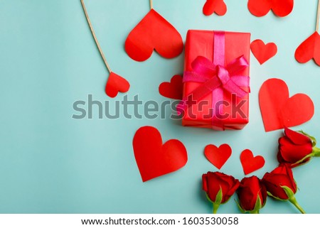 Gift box, little heart and red rose with background.Valentine day concept 