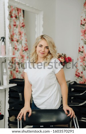 beautiful girl working in a beauty salon