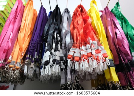 
colorful ID card hangers for sale in stores