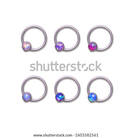 
piercing jewelry. rings with opals