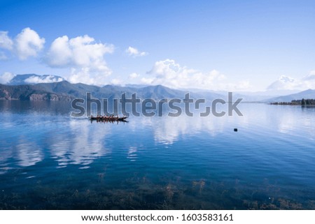 Blue sky reflecting on valley lake