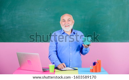 Handsome man use modern technology. Digital technology. Online course for programmers. School teacher programming with laptop. Programming web development. Teacher teaching programming language.