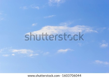 White cloudy on blue sky blurred background