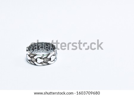 Silver wedding rings on white background