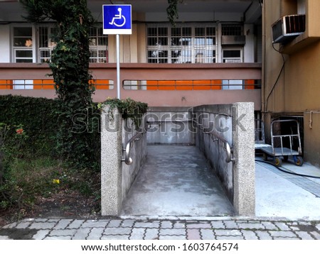 Wheelchair signs, inclined planes installed in addition to or in place of stairs, ramps for the disabled, strollers, strollers with stainless steel rods to prevent falls