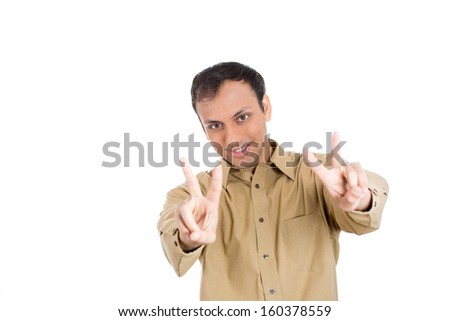 Closeup portrait of handsome, smiling guy holding up peace or victory sign , isolated on white background with copy space. Positive human emotions and facial expressions, communication. Life success 