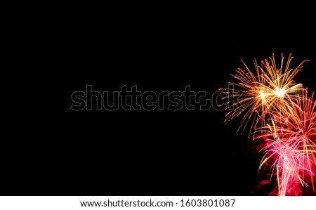 colorful firework on the dark background. black sky background with free space for text. Celebration and anniversary concept