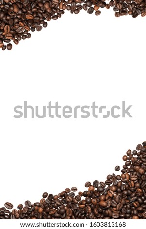 Group of roasted coffee beans isolated on white background with copy space. Vertical photography
