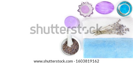 Composition with lavender flowers and natural cosmetic isolated on white background. Flat lay,top view. Wide photo. Free space for text.