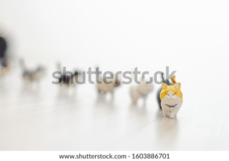 Cute smiling cat doll.Copy space.