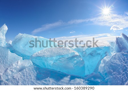 Winter Baikal lake landscape with Sun on blue sky Royalty-Free Stock Photo #160389290