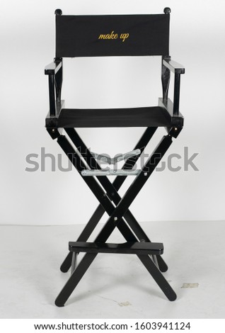 black director`s chair isolated on white background
