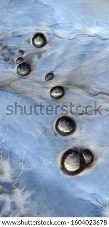 torture, vertical abstract photography of the deserts of Africa from the air, aerial view of desert landscapes, Genre: Abstract Naturalism, from the abstract to the figurative, 