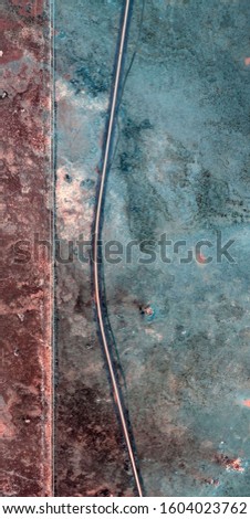 Trump's wall, vertical abstract photography of the deserts of Africa from the air, aerial view of desert landscapes, Genre: Abstract Naturalism, from the abstract to the figurative, 