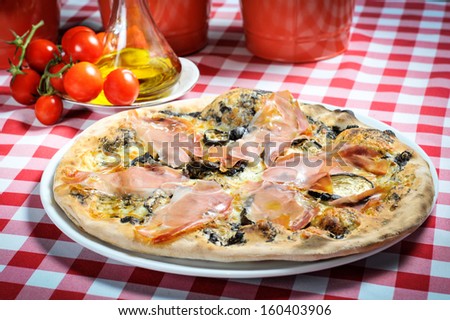 Pizza with ham - stock images