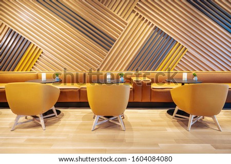 Eco design in a modern interior. Modern Interior. Wooden wall. 
The interiors use natural and eco materials that can fill the room with heat. Wood is a great material for adding warmth to spaces 
 Royalty-Free Stock Photo #1604084080