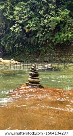 Pile of small stones in the middle of the river