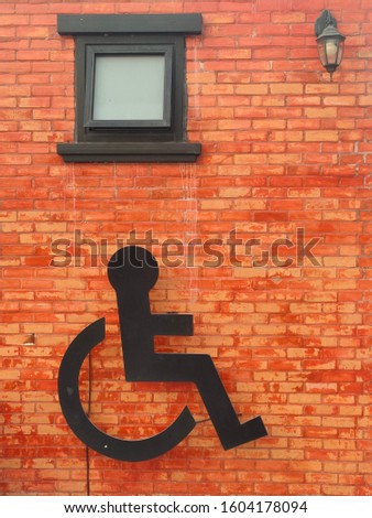 Signboard in front of the disabled toilet
