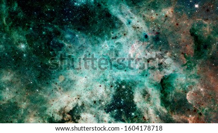 Green cosmic background. Nebulae space. Elements of this image furnished by NASA