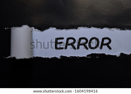 Error write on black and white torn paper
