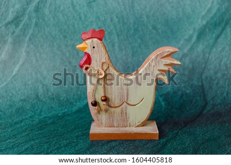 easter hen on green background