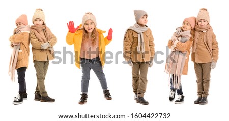 Set of children in winter clothes on white background